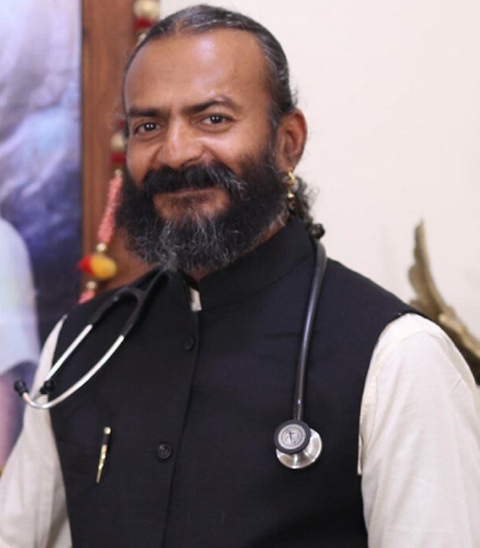 Dr. Dharmadhikari